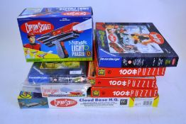 7x boxed Captain Scarlet items including light phaser, puzzles and other items.