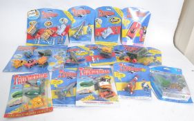 13x carded Thunderbirds diecast sets and vehicles.