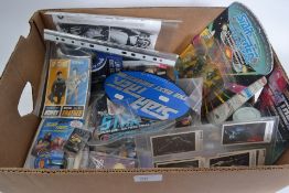 A quantity of Star Trek items (including vintage), comprising of carded figures, games, badges etc.