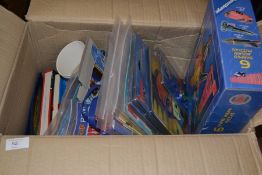 A large box of assorted Thunderbirds toys / items.