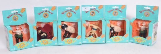 A collection of six Wallace & Gromit Wacky Wind Ups