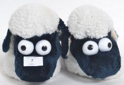 A pair of Wallace & Gromit Shaun The Sheep slippers.