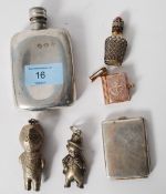 An assortment of silver plated items including two small baby rattles of children a small drink