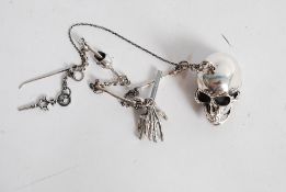 A Victorian style white metal / silver (stamped 925) scull and bones fob watch chain and key. weight