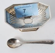 A 20th century silver salt dish and a small spoon. Dish weighs 35grams