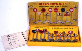 DIECAST: An original vintage Dinky Toys 771 International Road Signs boxed set of diecast signs.