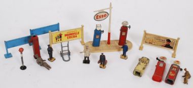 A collection of vintage diecast accessories, comprising of two Meccano Wills Capstan Cigarettes /