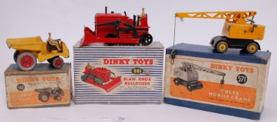 A collection of vitnage original 1950's Dinky Toys diecast construction themed models -