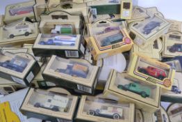 A collection of 50+ diecast Models Of Days Gone by Lledo each in original box, unopened.