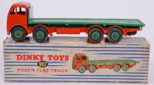An original Dinky Toys 902 Foden Flat Truck diecast lorry, in original box. Orange and green