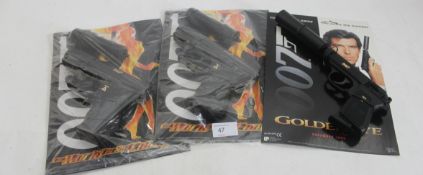 JAMES BOND: A collection of three James Bond plastic replica guns, each on card backing. Two from