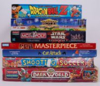 GAMES: A selection of board games including cat attack , a Chad Valley Shooting Soccer football game