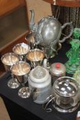 A collection of silver plated wares to include goblets etc along with pewter teapot etc
