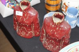 2 Chinese vases in the form of bodies having holes at the neck