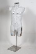 A vintage 20th century Industrial hanging shop mannequin / tailors window dummy raised on chrome