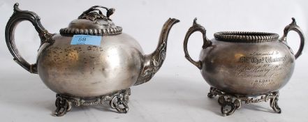 Two 19th century silver plate items to include teapot and engraved pot dated 1859.