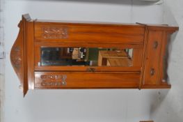 An Edwardian satin walnut single wardrobe / armoire. Raised on plinth base with a plinth drawer
