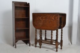 A 1930`s upright mahogany open window bookcase cabinet together with a drop leaf occasional table