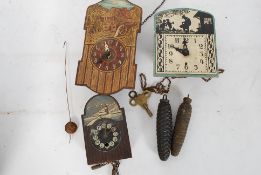 A collection of 3 small Black Forest, German wooden clocks  ( see illustration)