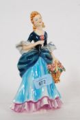 A vintage 1959 Goebel china figurine of FF 275 - lady with flower basket. Goebel mark to base.