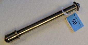 A large silver pencil holder hallmarked for Chester 1907 J.N.K & Co Rd No 506297 weighing 0.7