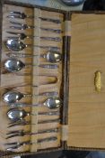 A collection of silver hallmarked and silver plated flatware to include cased apostle spoons etc