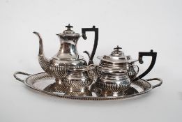 An early 20th Century Mappin & Webb silver plate service to include coffee pot, teapot, milk jug and