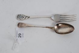 An antique sterling hallmarked sterling silver knife and fork - the fork with intricate detail to