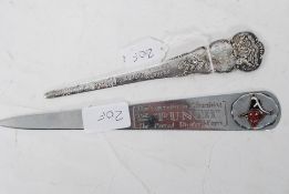 2 vintage Punch advertising letter openers, One for Punch with enamel set pictorial together with