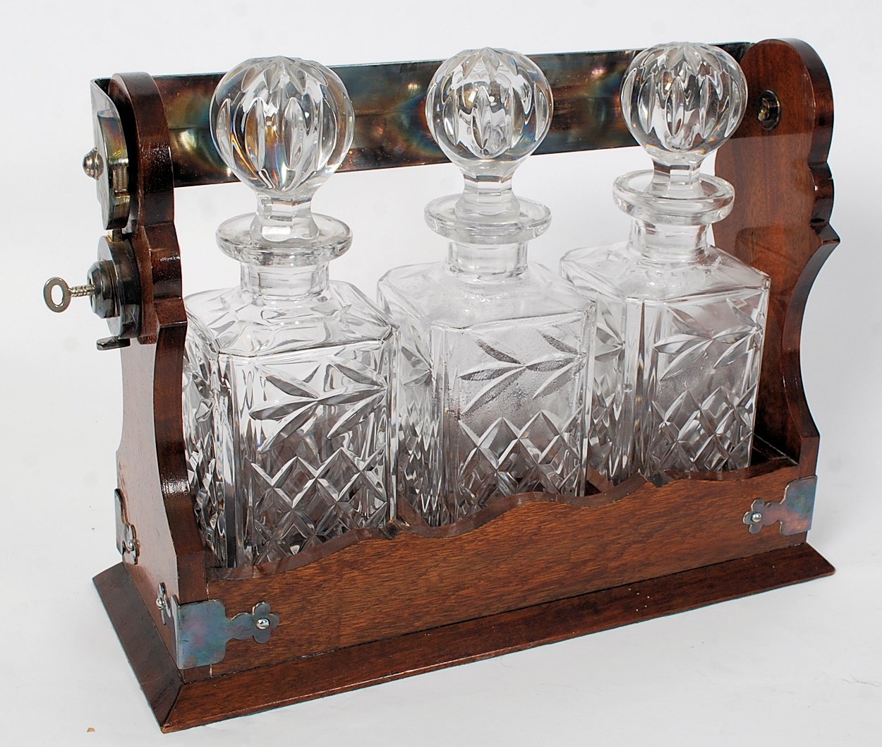 A 19th century Victorian oak and silver plated Tantalus with ornate ivy epns handle and mounting - Image 5 of 6