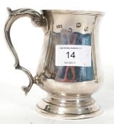 A good 20th century hallmarked silver tankard  bearing marks for Sheffield 1968. The tankard with
