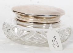 A silver hallmarked cut glass ladies dressing table pot. The silver lid for B& CO impressed Sterling