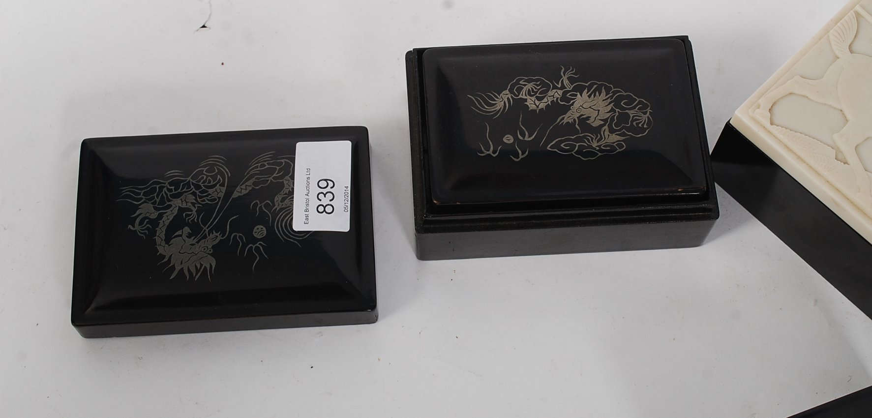 A Collection of Japanned laquered graduating boxes with decorative tops having pictorial design to - Image 2 of 2