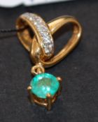 18ct gold diamond and emerald drop pendant