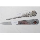 2 vintage Punch advertising letter openers, One for Punch with enamel set pictorial together with