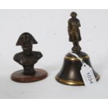 A bronzed miniature bust of Nelson mounted on a wooden base together with a Brass bell with Nelson