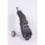 GOLFING: A good set of Left Handed golf clubs, by MD - along with golf bag and trolley and other