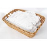 A basket of assorted vintage linens to include night dresses & tablecloths etc
