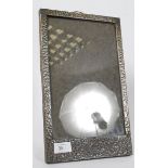 A good Arts & Crafts hammered pewter rectangular photograph / picture frame with easel back.  Weight
