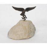 A 20th century bronze German Eagle and Swastika mounted on a granite base