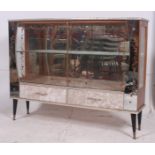 A good mid 20th century glazed decorative 1950's display /cocktail cabinet with mirror back having