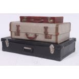 A stack of vintage three vintage suitcases to include a leather Masonic case.  17cm x 78cm x 43cm