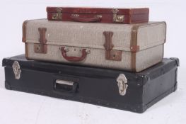 A stack of vintage three vintage suitcases to include a leather Masonic case.  17cm x 78cm x 43cm