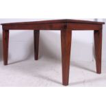 A large 20th century refectory dining table, made of hardwood raised on squared tapered legs with