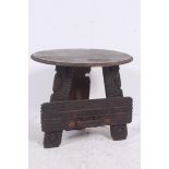An unusual early 20th century carved hardwood table believed to have been made by a soldier