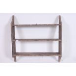 A Shabby Chic country Pine large hanging wall shelf having shaped end supports. Measures  92cm x