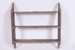 A Shabby Chic country Pine large hanging wall shelf having shaped end supports. Measures  92cm x