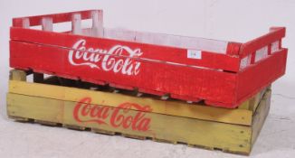 2 wooden painted crates of large form bearing notation for Coca-Cola. H16cm x W76cm x D48cm