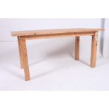 A good 20th century Shabby Chic oval country pine dining  table raised on turned legs with fitted