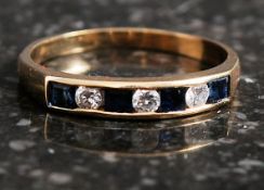 Yellow gold channel set sapphire and dia